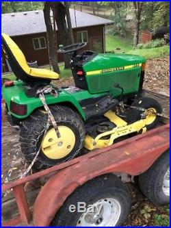 2001 John Deere 455 Diesel Tractor 1400 hrs wheel weights and chains can deliver