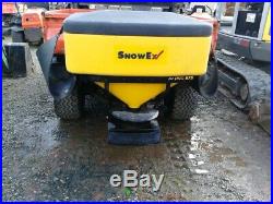 2006 RTV900W-H utility vehicle with Cab, Snow Ex 575 spreader, BOSS HD V-Plow