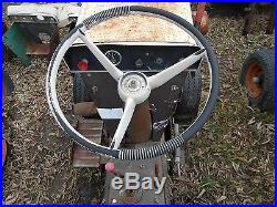 Bolens 1050 tractor with mower deck and plow blade for parts or repair