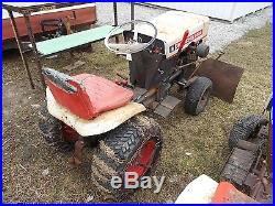 Bolens 1050 tractor with plow blade and mower deck