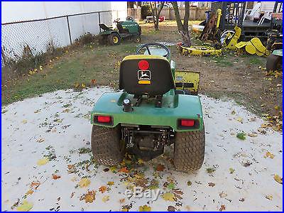 JOHN DEERE 318 GARDEN TRACTOR WITH PLOW AND MOWER DECK