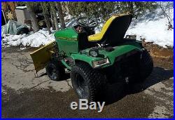 John Deere 445 garden tractor with 54 inch 4 way plow and quick hitch
