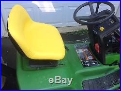 John Deere LX188 lawn tractor/mower with snow blower and grass bagger