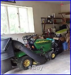 John Deere LX277 lawn tractor with 42 mower deck, rear bagger, 44 plow