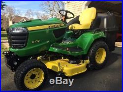 Mint John Deere X738 garden tractor (4X4) comes with bagging system 100 Hours