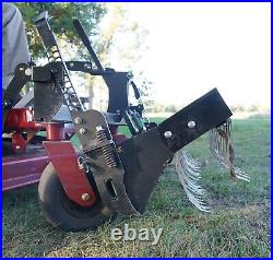 Swinging Tool Bar and Rake Ezra Lawn Care Equipment mounts on a zero turn mower